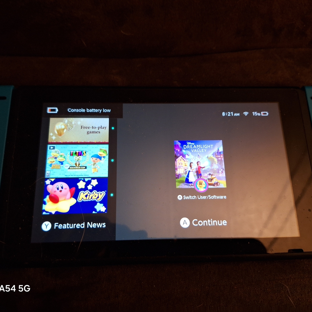 Nintendo Switch with Blue and Black Joy-Con